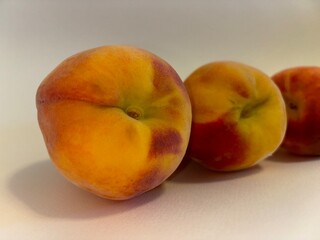 Juicy peach isolated on white background. Tasty and healthy fruit. Healthy and proper nutrition