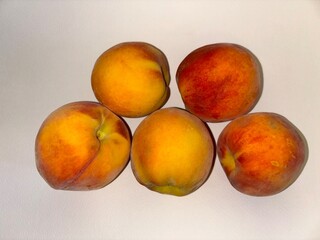 Juicy peach isolated on white background. Tasty and healthy fruit. Healthy and proper nutrition