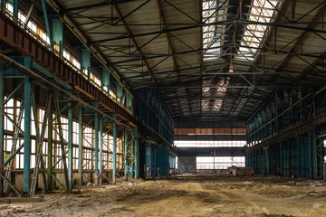 Fototapeten Verlassene Gebäude Old factory with objects abandoned inside and growing nature, power of life  © Stefana