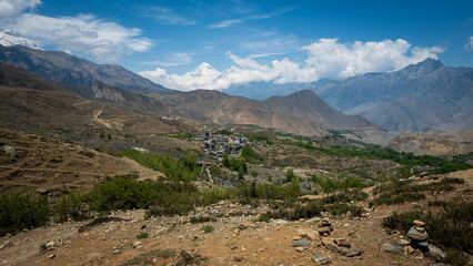 The pilgrimage town of Muktinath in Mustang, Nepal, with the Dhalaugiri Himalaya peaks in the distance