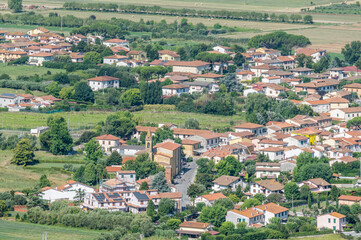 Fototapeta premium Aerial view of Gello, a hamlet of the Italian municipality of San Giuliano Terme, in the province of Pisa