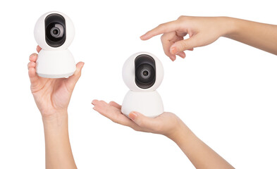 Fototapeta premium Hand hold wireless security camera on white background.