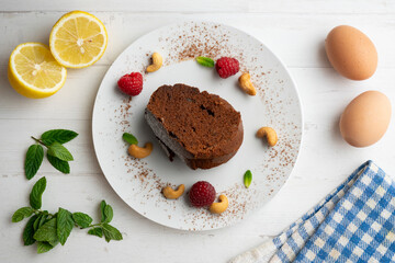 Delicious piece of chocolate cake seen from an overhead perspective.