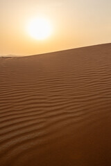 Sunset in the desert dunes in Dubai, UAE