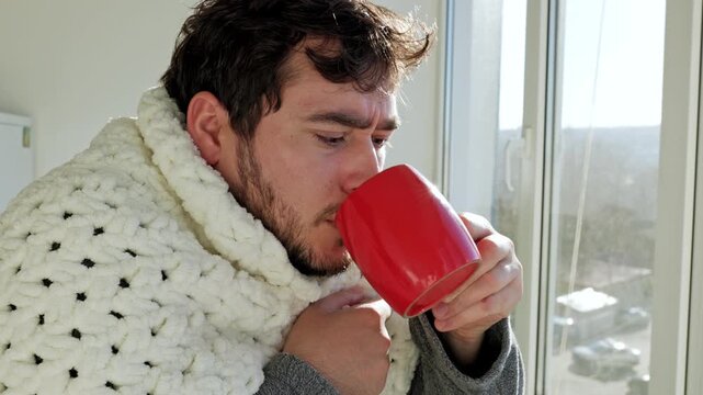 True to Life Stressed Man with Flu, Drinking in Kitchen