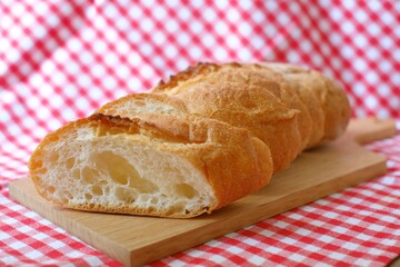 Baguettes on a wooden board