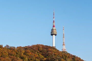 Obraz premium N Seoul Tower with autumn landscape. It is also known as Namsan Tower or Seoul Tower, the landmark which is a communication and observation tower located on Nam Mountain in central Seoul, South Korea
