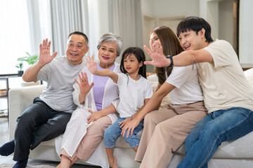 Portrait of happy love family asian father and mother playing with adorable asian kid girl.daughter, care, insurance.Happy family moments good time love with grandparents.Love of big family