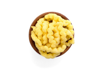 Cheese corn sticks in wooden bowl isolated on white background.