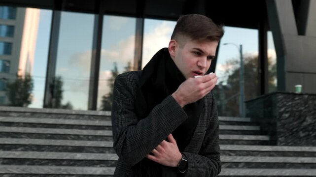 Unpleasant Symptoms Young Man Ails from Flu, Sneezing and Coughing Outdoors