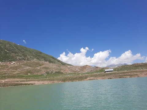 Beautiful daytime view of Saiful Malook Lake in Pakistan. Saiful Malook is a mountainous lake in northern Pakistan, located at the northern end of the Kaghan Valley, near the town of Naran. 