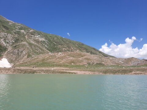 Beautiful daytime view of Saiful Malook Lake in Pakistan. Saiful Malook is a mountainous lake in northern Pakistan, located at the northern end of the Kaghan Valley, near the town of Naran. 