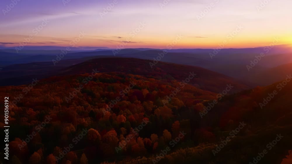 Poster A cinematic aerial view of the autumn hills at twilight with the fading light casting a dreamy ethereal glow.