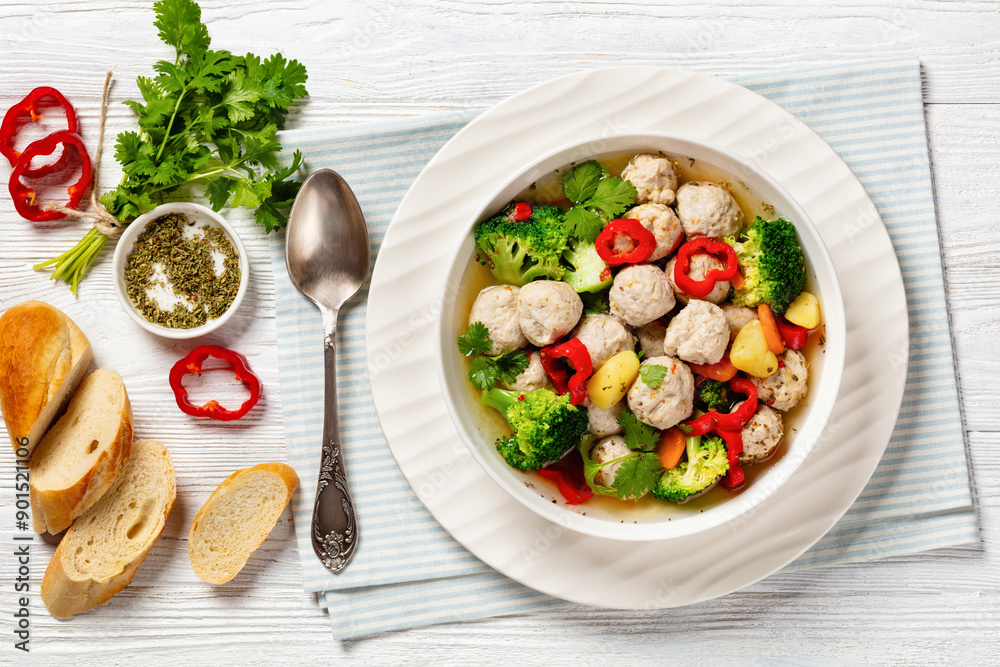 Wall mural chicken meatball soup with vegetables in a bowl