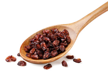 Dried barberry in a wooden spoon close-up on a white background.