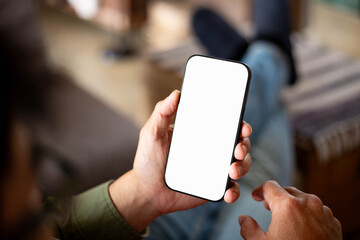 cell phone blank white screen mockup.hand holding texting using mobile on desk at office.background empty space for advertise.work people contact marketing business,technology