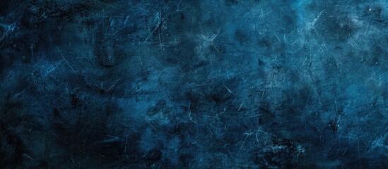 Fototapeta premium Blank textured surface in blue and black hues ideal for backgrounds and backdrops with copy space image
