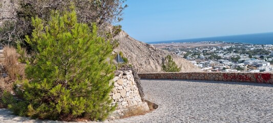 view of Kamari city in Santorini from the ancient thera road