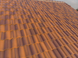 Background of orange brown new house roof texture in rural village real estate industry