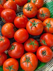texture of the red juicy tomatoes on the counter in the store of organic farmers products