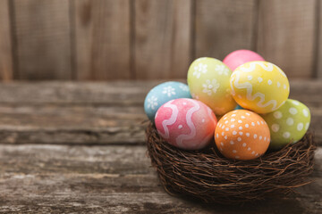 Easter eggs on a bright background. Easter celebration concept. Colorful easter handmade decorated Easter eggs. Place for text. Copy space.