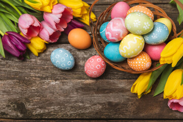 Easter eggs on a bright background. Easter celebration concept. Colorful easter handmade decorated...