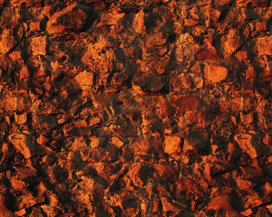 Texture of an old rough stone castle wall.