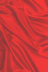 Red silk or satin luxury fabric texture can use as abstract background. Top view.