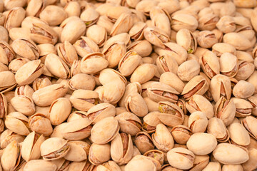 Tasty pistachios isolated on a white background.