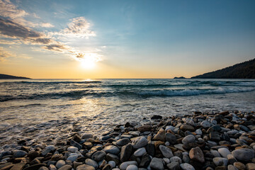 Obraz premium a sunset on the sea beach
