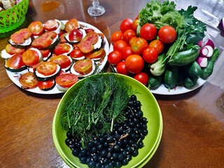 Black currant. Fresh vegetables on the table.