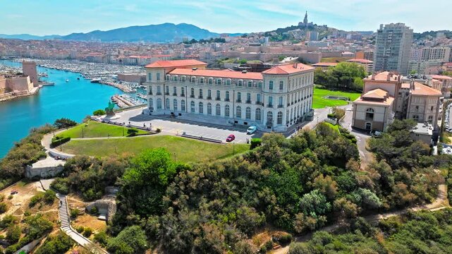 Aerial View Of Palais du Pharo Overlooking Seafront In Marseille, France. French Cultural landmark, conference centre with gardens overlooking the seafront.