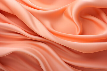 Obraz premium Texture of draped fabric of peach color. Beautiful emerald peach fuzz soft silk textile. Design for texture, background, wallpaper.