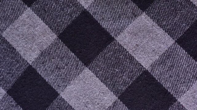 Rotating plaid flannel fabric. Checkered flannel cloth rotate