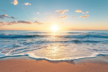 Obraz premium A serene beachscape with the sun rising and casting a golden glow over the sand and sea. 