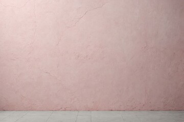 Fototapeta premium Pale pink concrete wall. Light pink backdrop.