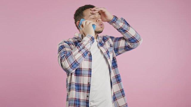 Angry Handsome Man Quarreling, Screaming Talking On Mobile Phone. Guy In Stress
