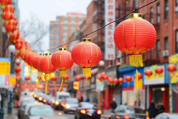 Colorful red lanterns adorn the streets of Chinatown, creating a festive atmosphere during the...