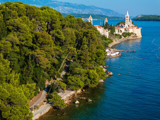 Aerial view of the old town of Rab and forest park, the Adriatic Sea in Croatia
