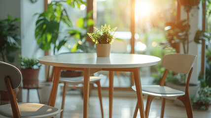 Obraz premium Dining table and chairs with indoor plants and morning sunlight.