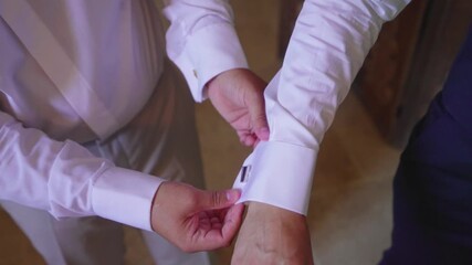 Adjusting Cufflinks on Wedding Day
