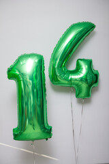 green foil number 14 balloons
