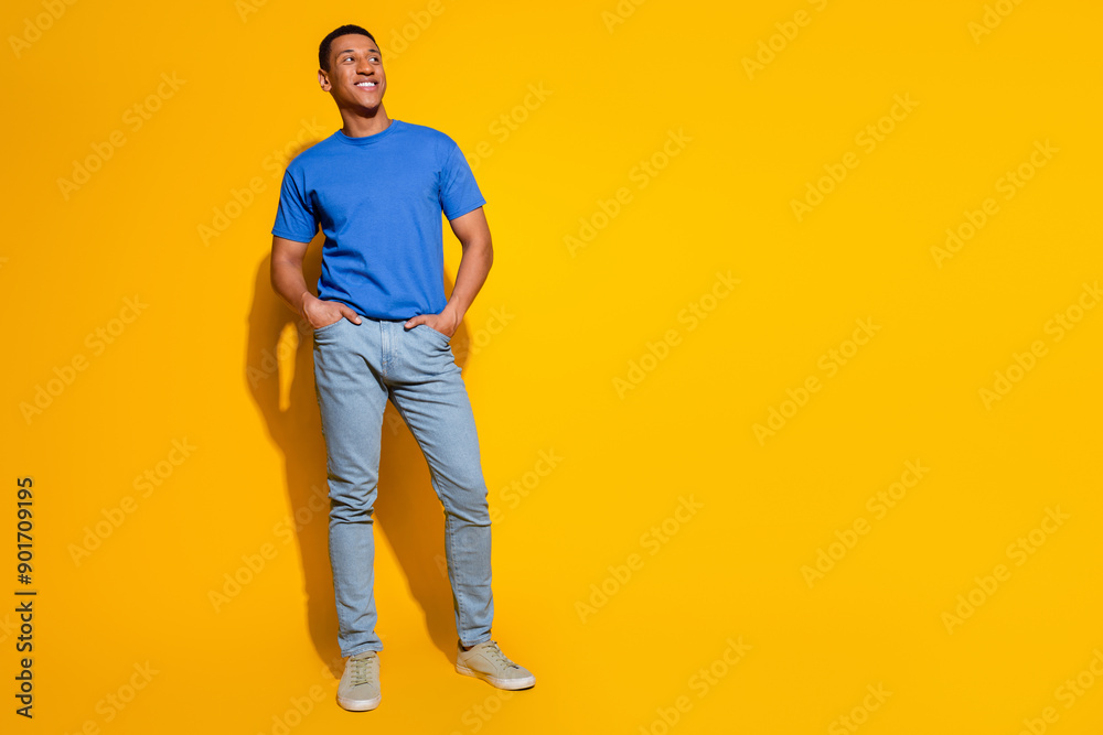 Canvas Prints Full size photo of pretty young male look empty space wear trendy blue outfit isolated on yellow color background