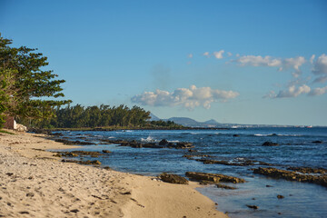 View of beautiful white rocky tropical beach, Mauritius Island