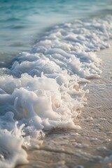 Fototapeta premium Gentle Waves on Sandy Beach