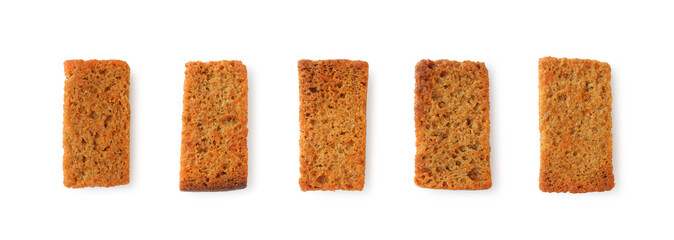 Rye croutons isolated on white background top view, homemade brown bread rusks, roasted salted snack      