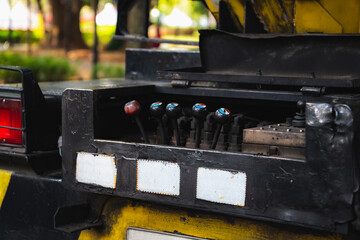 control lever at the rear of the bucket truck, used to operate the boom © Dipo