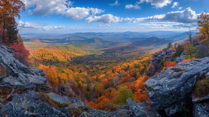 Fototapeta premium Wide-angle view of an autumn mountain landscape, capturing the vibrant colors and expansive scenery.