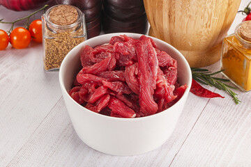 Raw beef meat - sliced strips