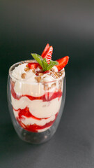 strawberry dessert in a glass, layers of cream and strawberries, strawberry tiramisu
